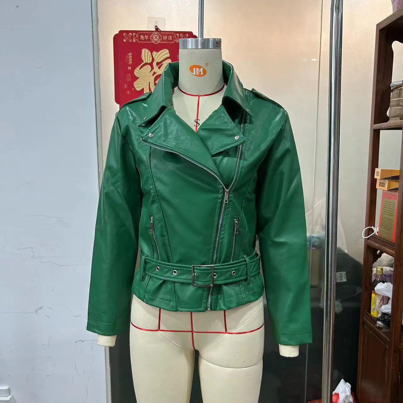 Women's black punk locomotive style jacket with a Peter Pan collar and drawstring waist.