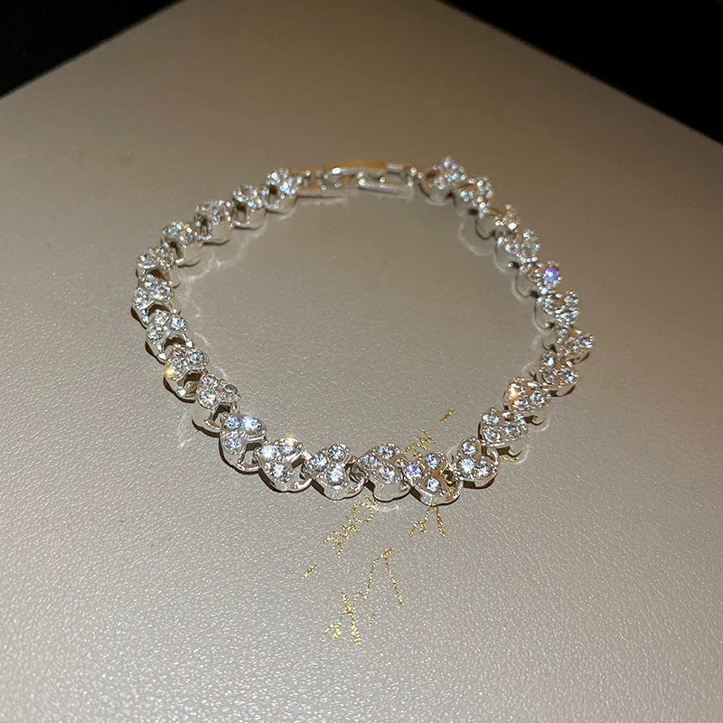 Silver heart-shaped metal bracelet for women with inlaid zircon