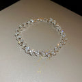 Silver heart-shaped metal bracelet for women with inlaid zircon