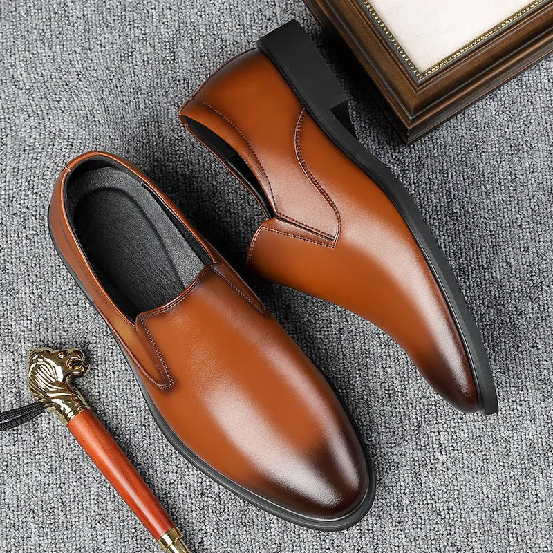 Men's black business casual slip-on shoes with leather uppers and rubber soles