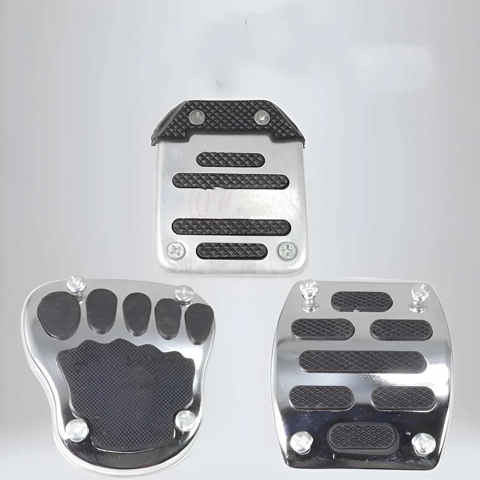 Metal motorcycle brake pedal skid plate showing three style options