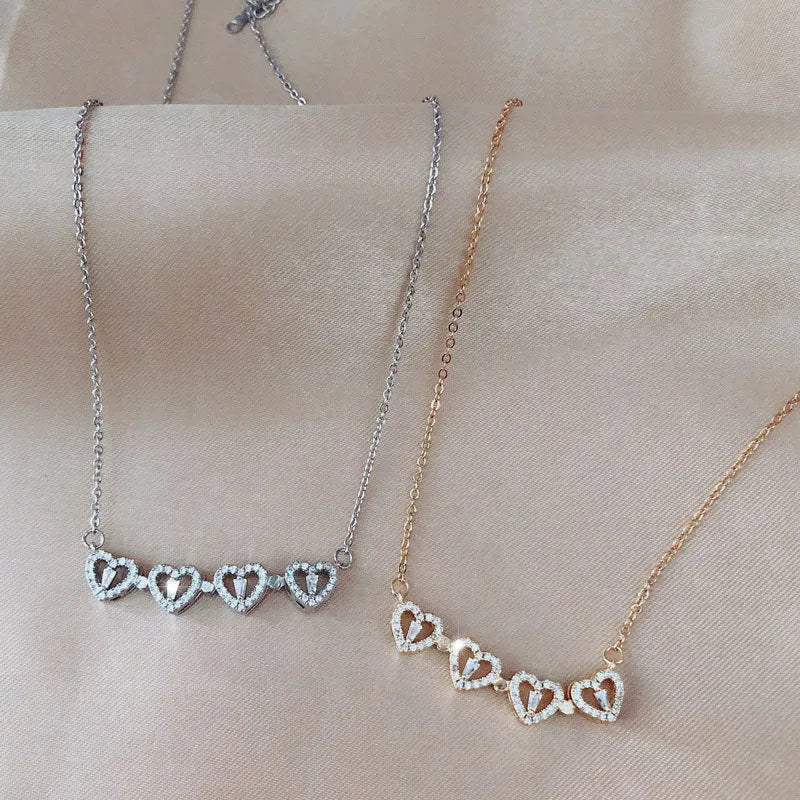 Silver detachable four leaf clover necklace in titanium steel with zircon stones and magnetic folding heart pendant