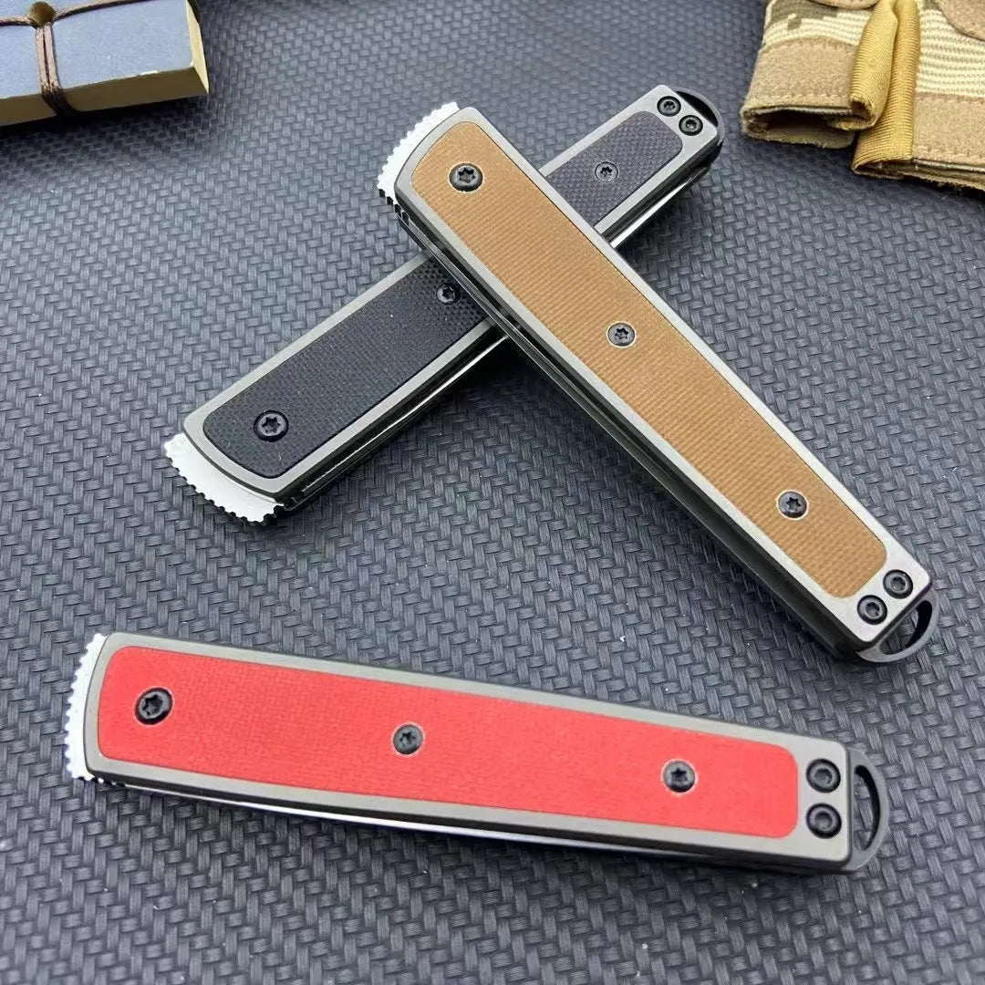 Folding fruit knife with stainless steel blade showing black, coffee colour, and red handle options