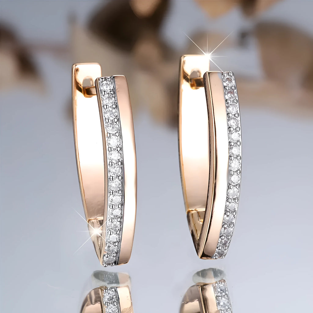 Women's V-shaped geometric earrings in champagne gold white diamond colour with electroplated copper construction
