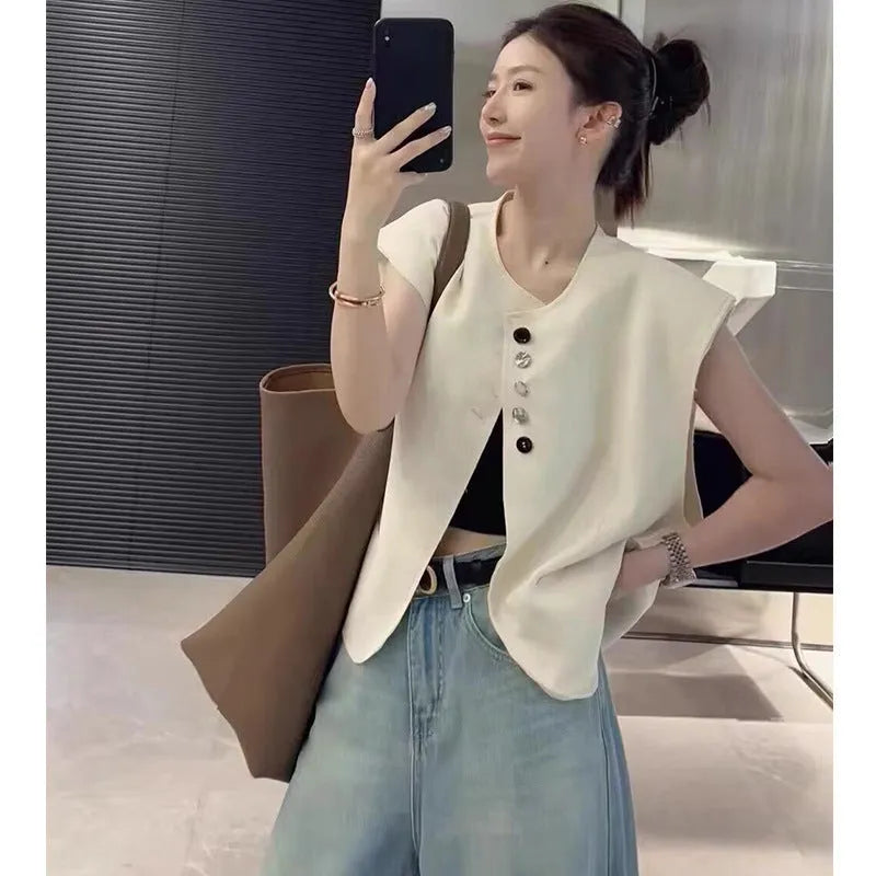 Women's loose-fit polyester vest with pockets in short 40cm length