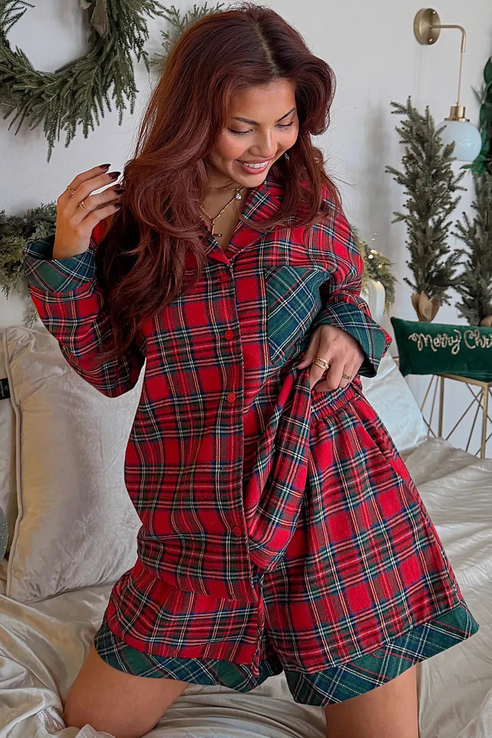 Red plaid long sleeve shirt and shorts from a men's Christmas pajama set.