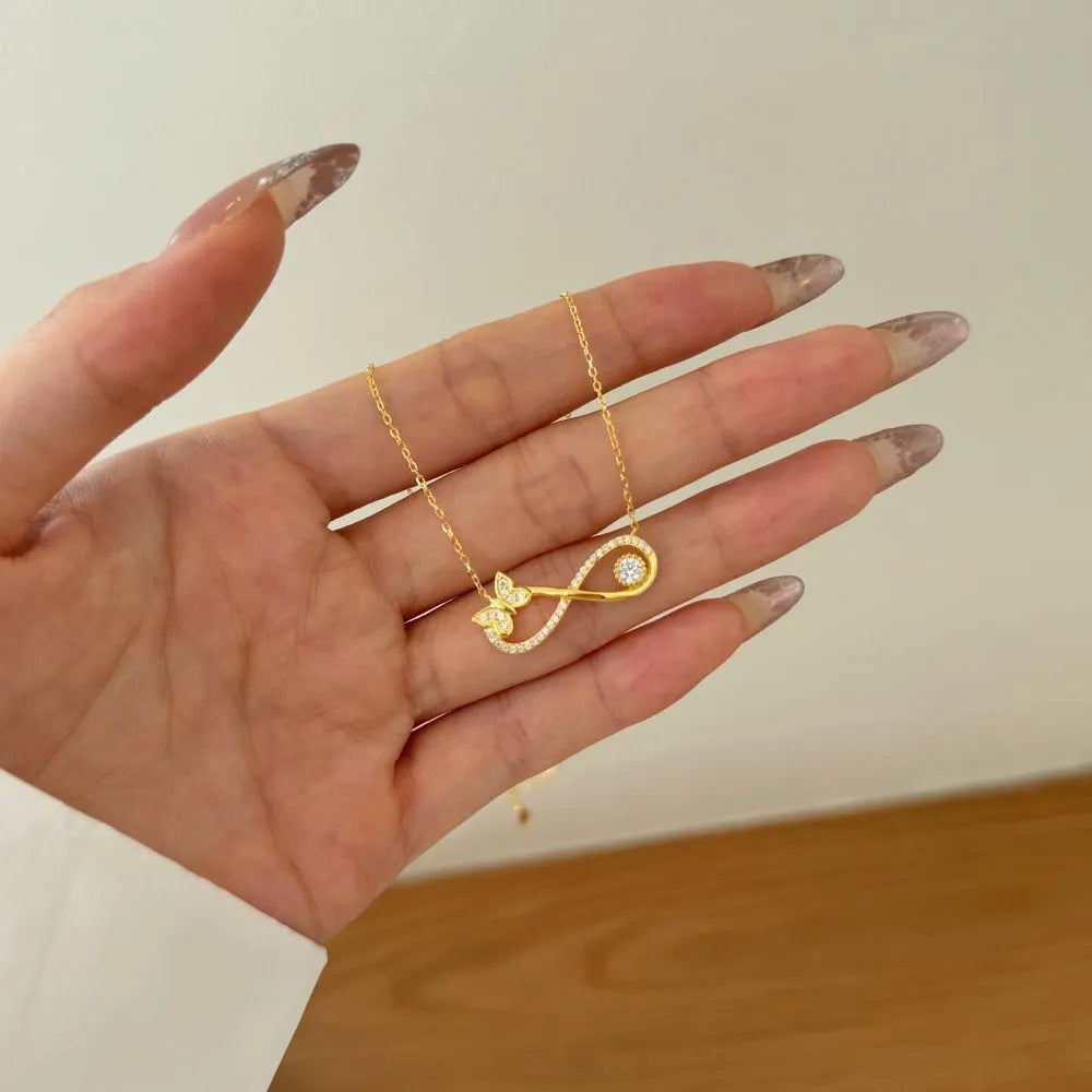 925 sterling silver Mobius bow zircon clavicle chain in gold or platinum finish with butterfly detail