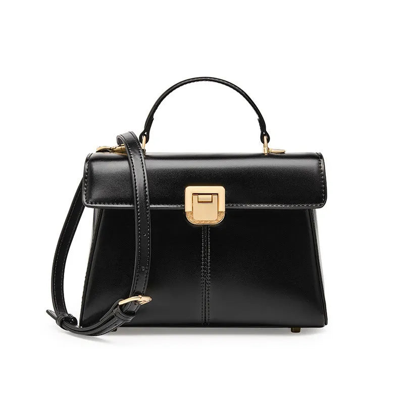 Genuine leather women's shoulder bag with clasp closure showing interior hidden compartment