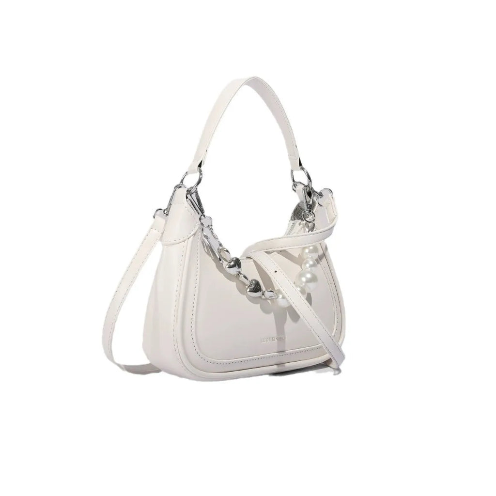 White PU crossbody shoulder bag with vertical square shape, three-dimensional outer pocket, and phone compartment.