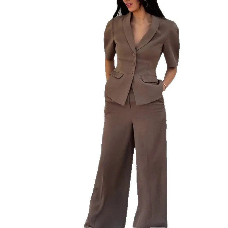 Brown men's two-piece polyester suit with a slim fit waist, shown on a hanger.