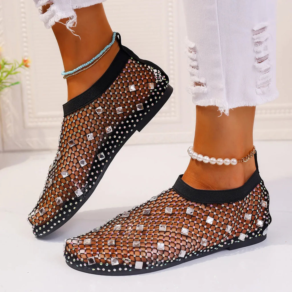 Women's flat sandals with mesh upper and colourful rhinestone design, round toe shape with rubber sole