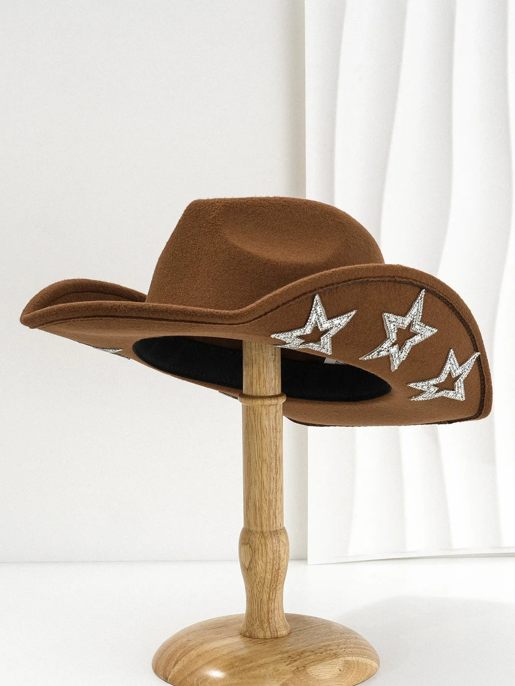 Beige polyester western-style top hat with a conical crown and a hexagonal star decoration on the side.