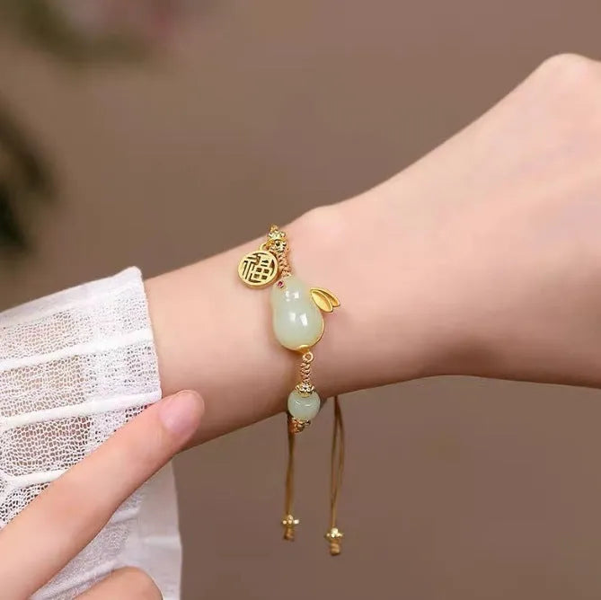 Hetian jade rabbit bracelet on yellow string cord with geometric pendant for women