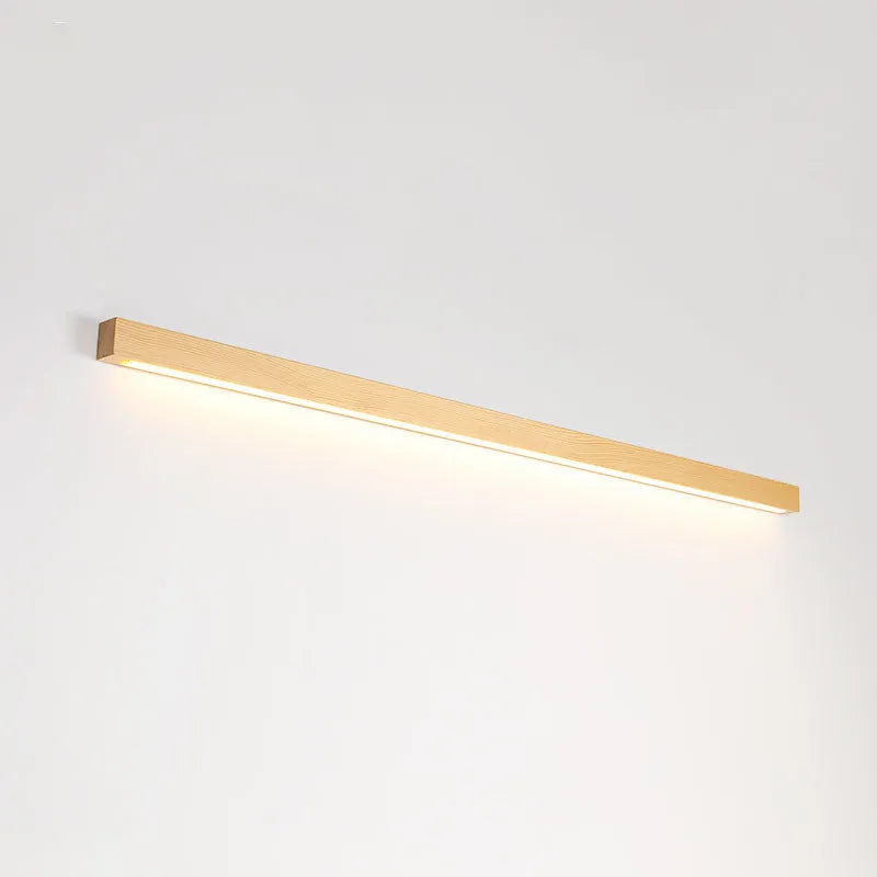 Modern walnut colour wood and acrylic wall lamp with LED lighting in minimalist log strip design