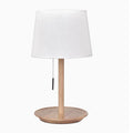 Walnut coloured solid wood desk lamp with a white cloth lampshade and a black cable switch.