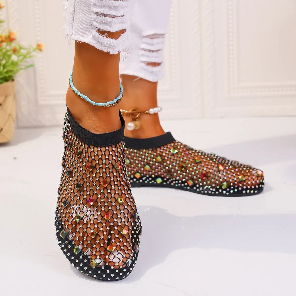 Women's flat sandals with mesh upper and colourful rhinestone design, round toe shape with rubber sole