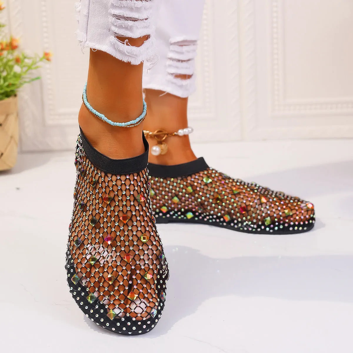 Women's flat sandals with mesh upper and colourful rhinestone design, round toe shape with rubber sole