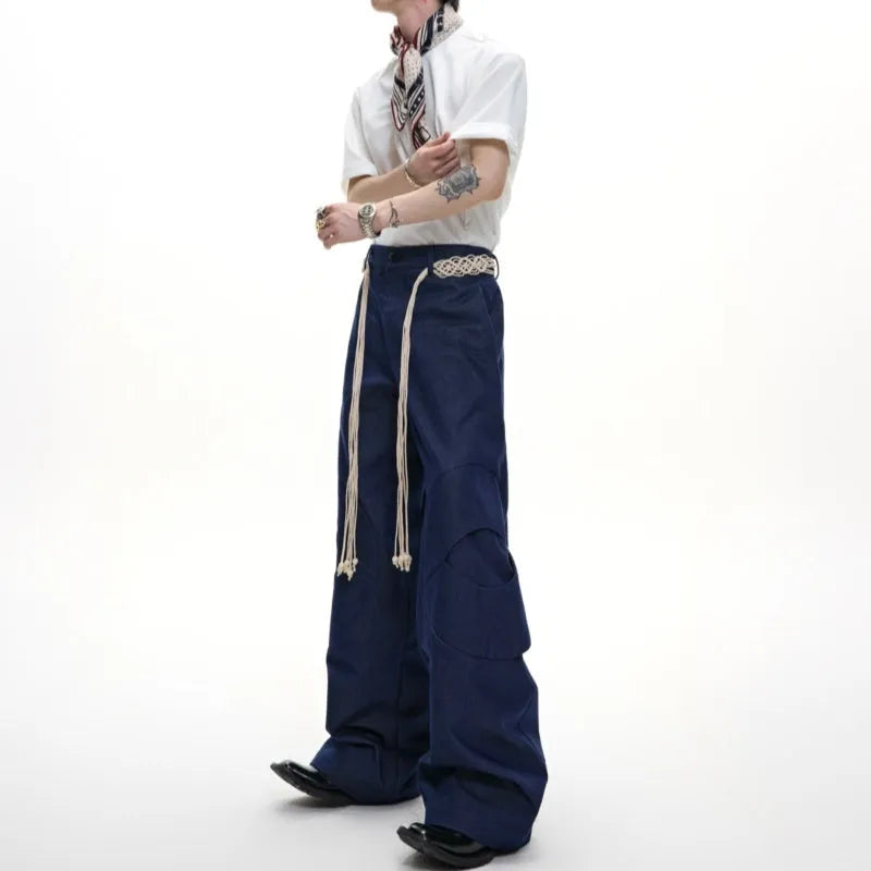 Men's straight-leg cotton jeans with decorative zipper details and tassel trim in dark colour options
