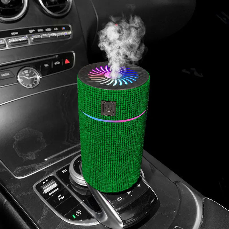 Compact car-mounted air purification humidifier unit on vehicle dashboard with USB power cord