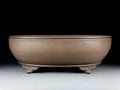 Handmade oval purple sand flowerpot with black mud design measuring 50x39.5x16cm