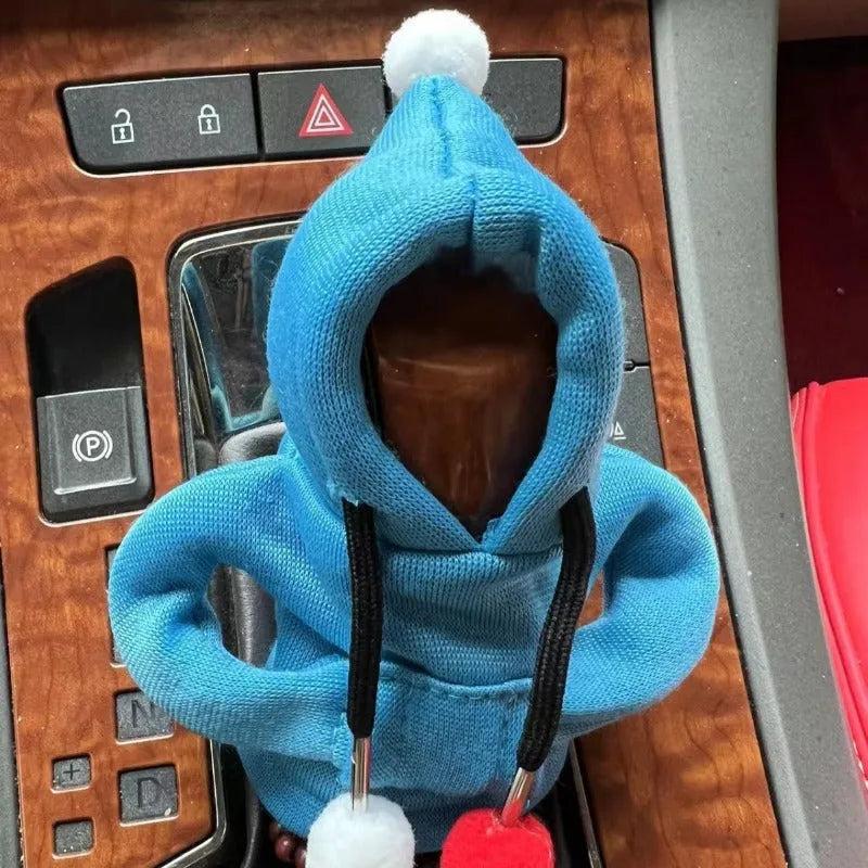 Santa Claus car gear lever cover in black or pink fabric with hooded sweatshirt design, fitting gear shift knob and handbrake.
