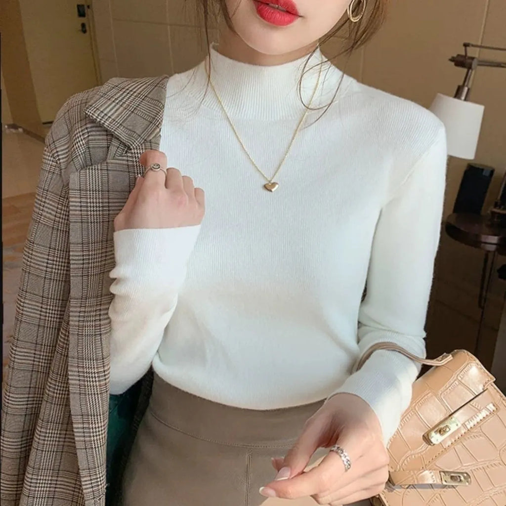 Slim fit long sleeve knitted shirt in viscose fibre shown in apricot colour
