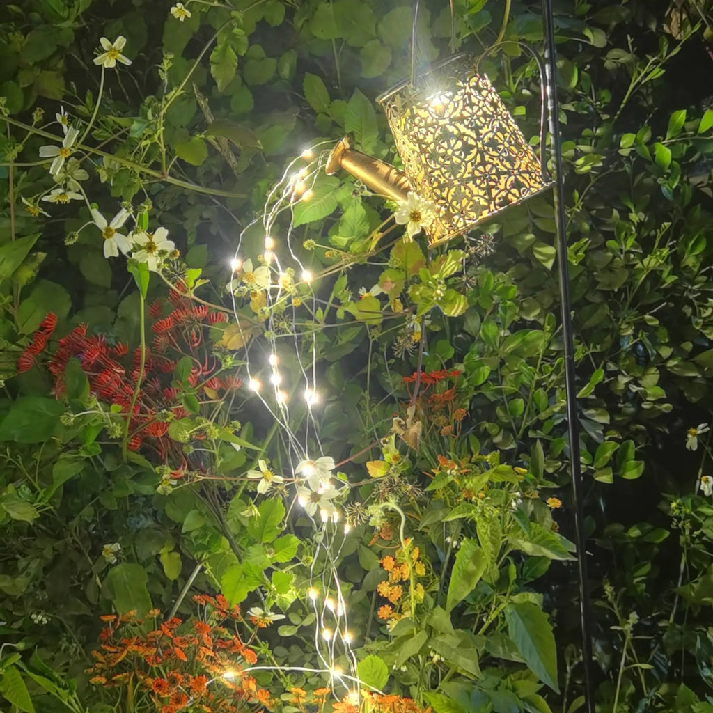 Solar-powered wrought iron butterfly kettle garden light with LED illumination
