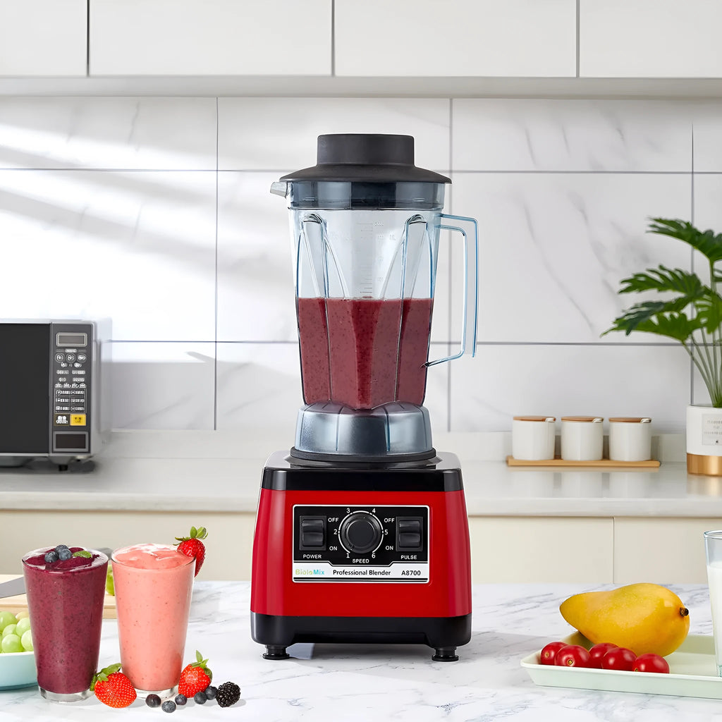 Red commercial blender with industrial design and 2200W motor for professional kitchens