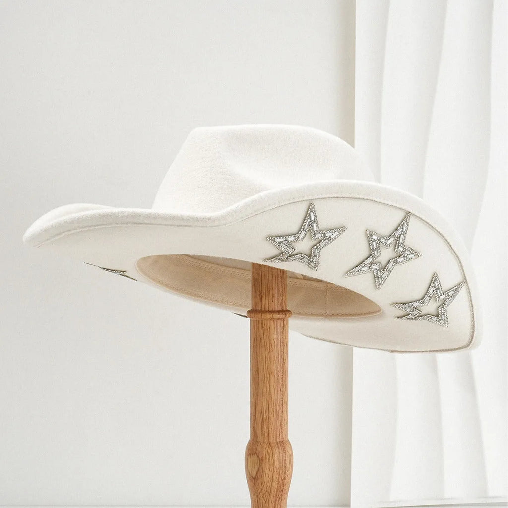 Beige polyester western-style top hat with a conical crown and a hexagonal star decoration on the side.