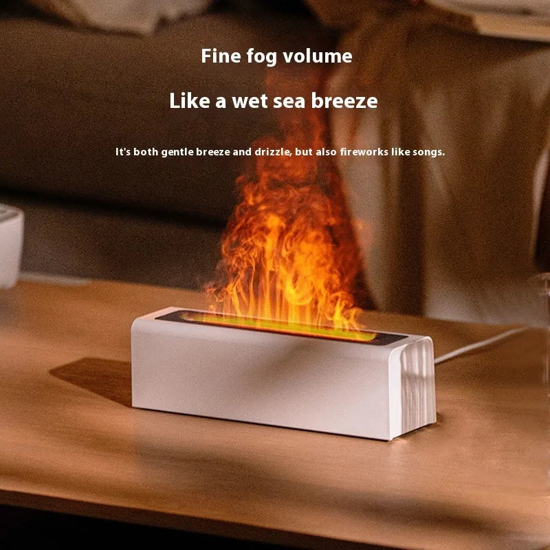 Square black and white USB aroma diffuser humidifier with colourful simulated flame lighting effect.