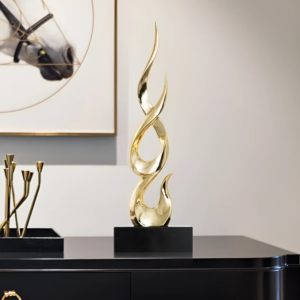 Modern resin festival decoration ornament in bright gold colour with handmade craftsmanship details