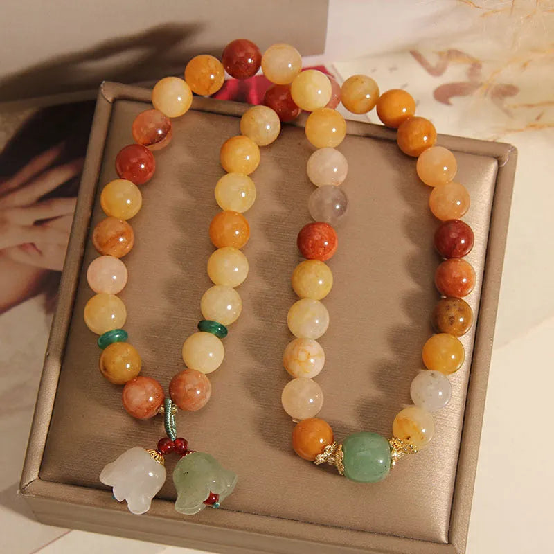 Natural jade multi-layer women's bracelet with orchid pendant charm on adjustable fastening