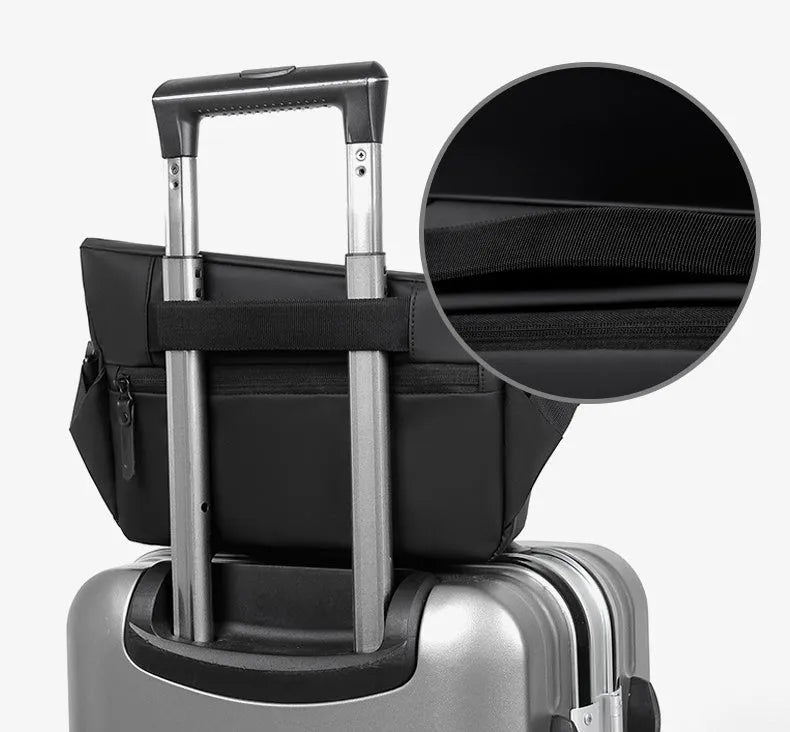 Men's grey medium crossbody bag with shoulder strap showing internal phone and document pockets