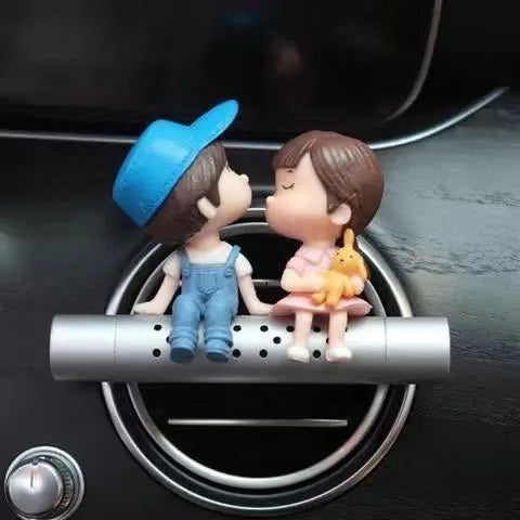 Cartoon couple car air outlet perfume clip in PVC and metal with included aroma stick, grey or blue option