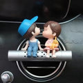 Cartoon couple car air outlet perfume clip in PVC and metal with included aroma stick, grey or blue option