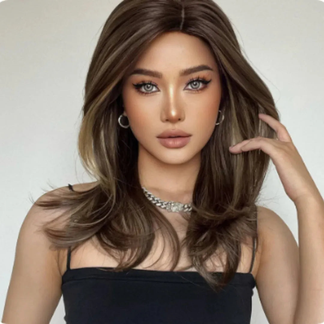Mid-length curly gradient colour wig in high-temperature fibre on a stand.