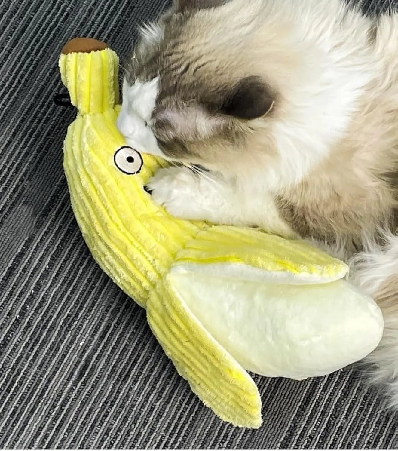 Yellow banana-shaped plush cat toy with crinkle sound, measuring 13 inches long.