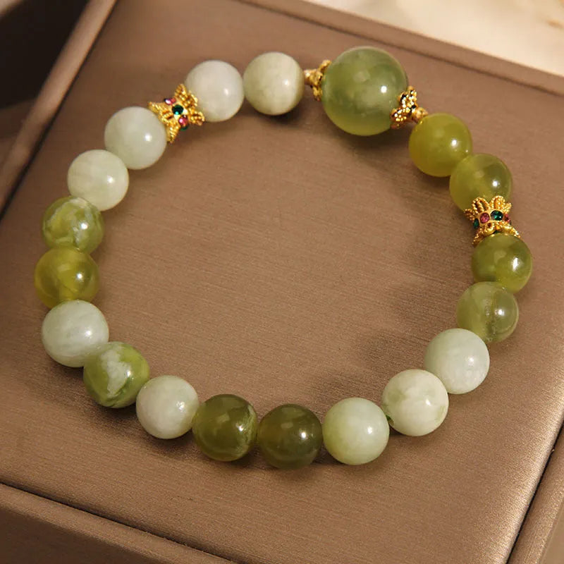 Women's original design jade bracelet in Xiuyan green colour with mori style aesthetic