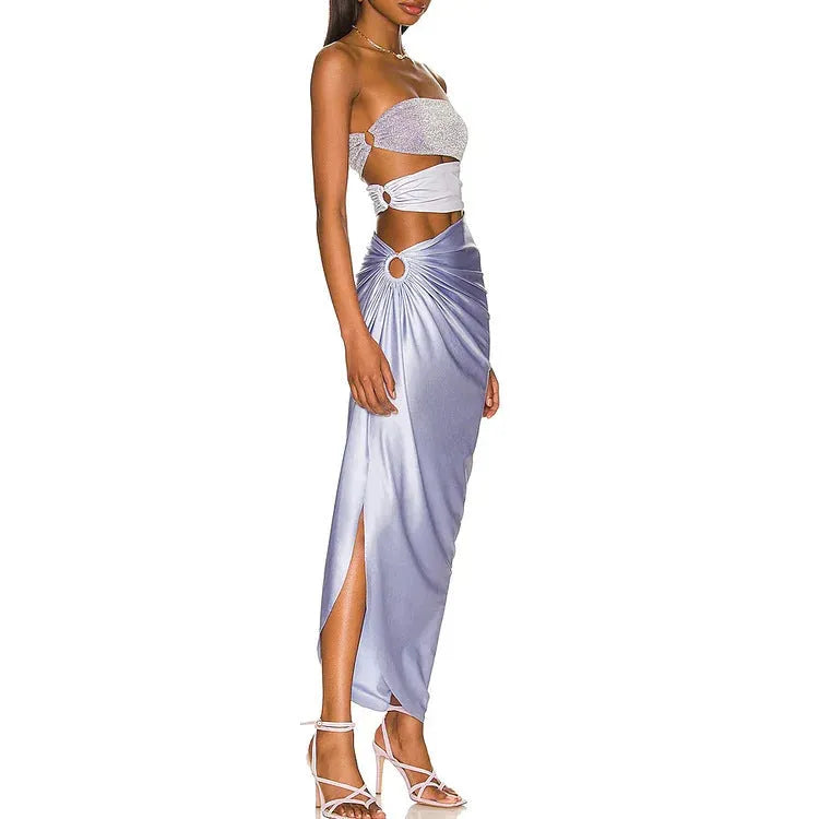 Purple one-piece swimsuit with matching wrap skirt on a mannequin, showing the tight fit and European/American styling.