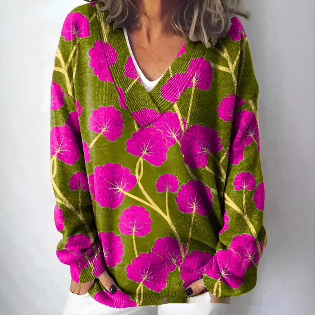 Women's grey V-neck sweatshirt with a white 3D floral pattern print and long sleeves.