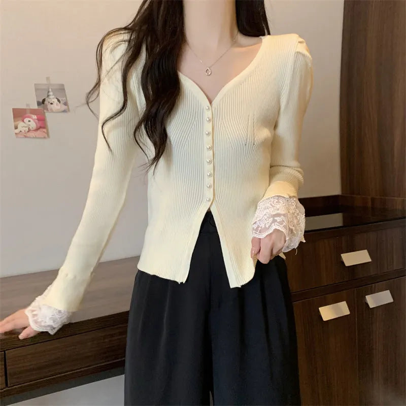 V-neck slim fit long sleeve top in mercerized cotton with lace stitching, shown in black, white, or brown, free size