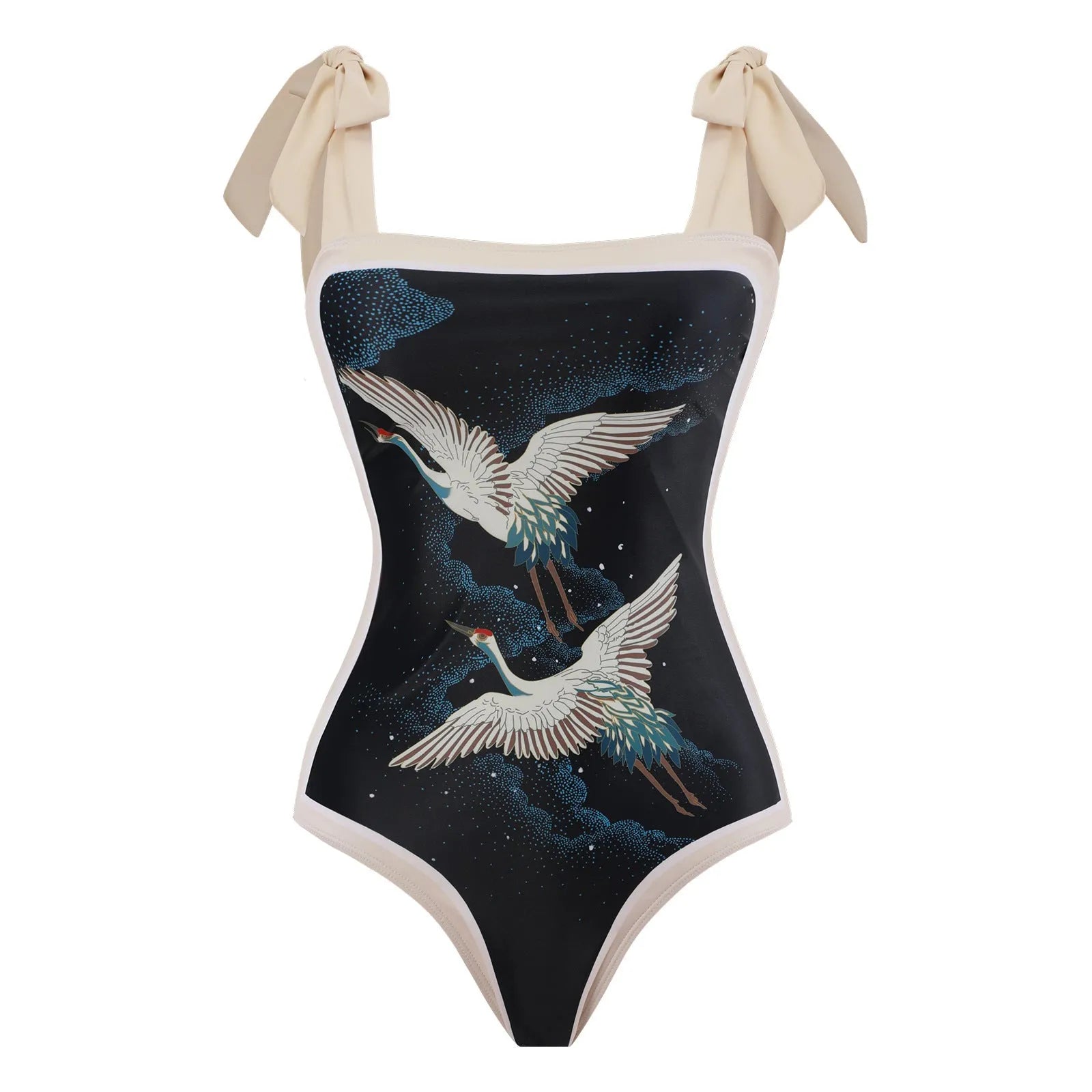 Yellow retro one-piece swimsuit with floral print and a sheer black chiffon skirt.