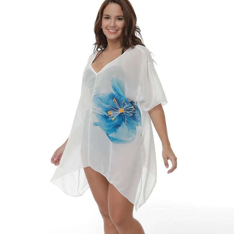 White plus size loose beach cover-up blouse for women on a hanger