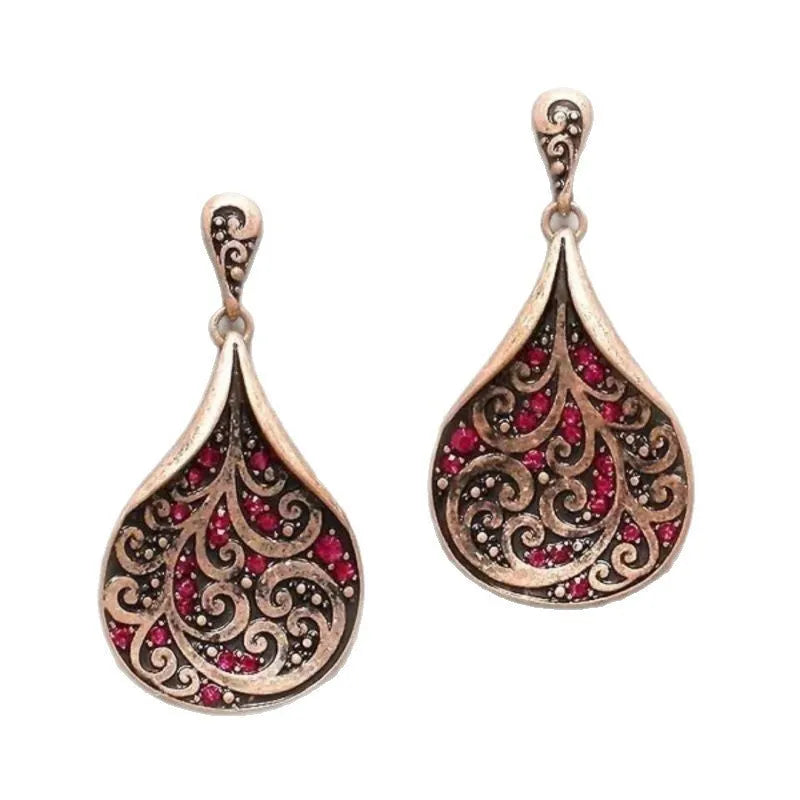 Gold retro ethnic minority fashion earrings with geometric shape and petal elements for women