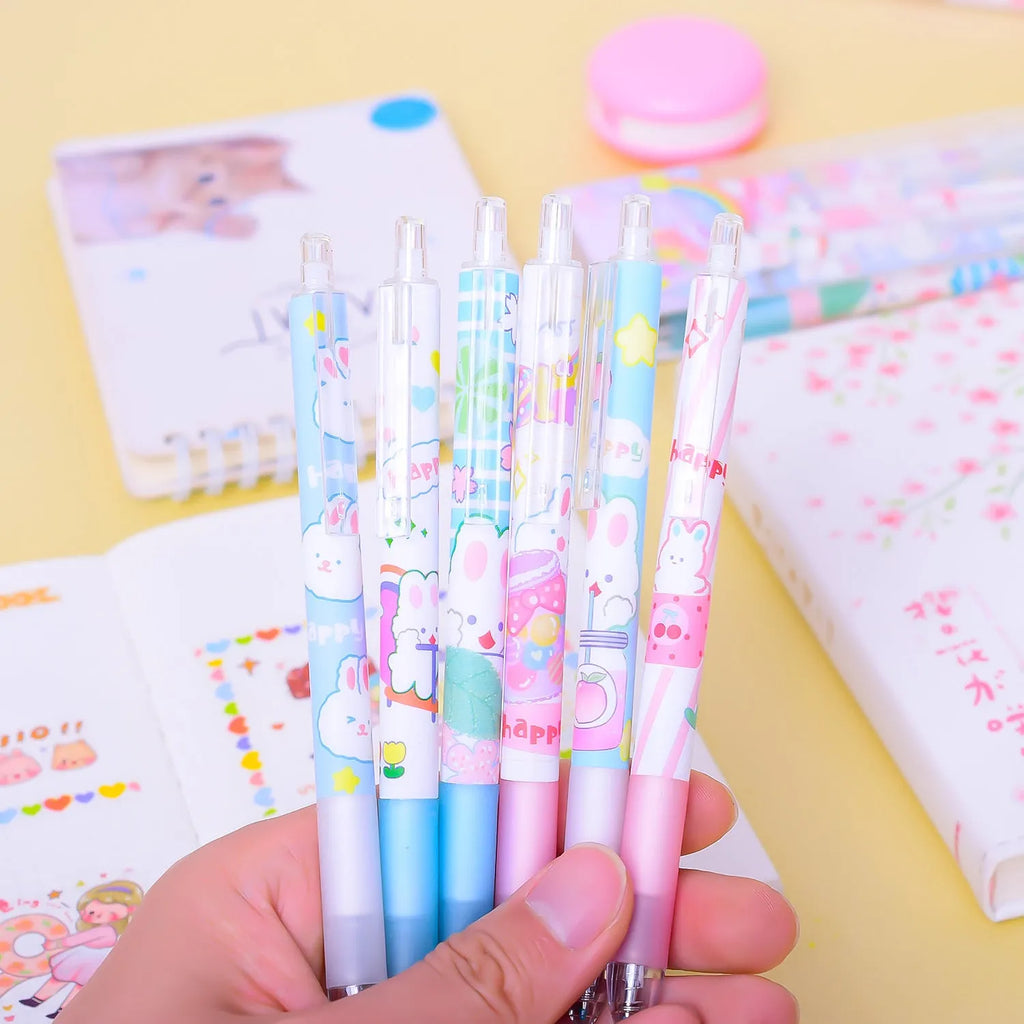 Six plastic ballpoint pens with cartoon bunny design showing 0.5mm tips and neutral black ink