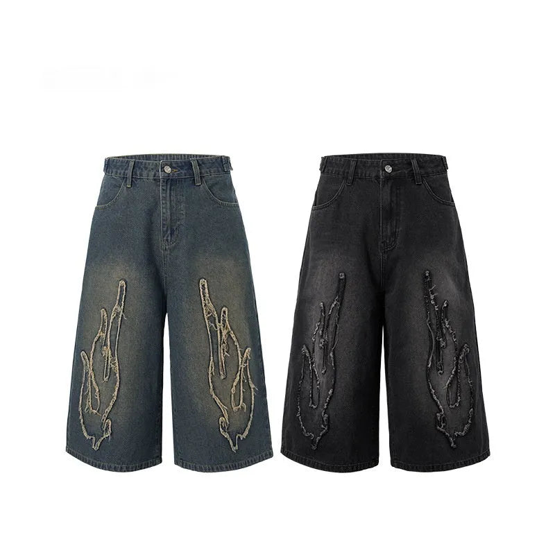 Men's black cropped denim shorts with flame embroidery patches, straight cut street style