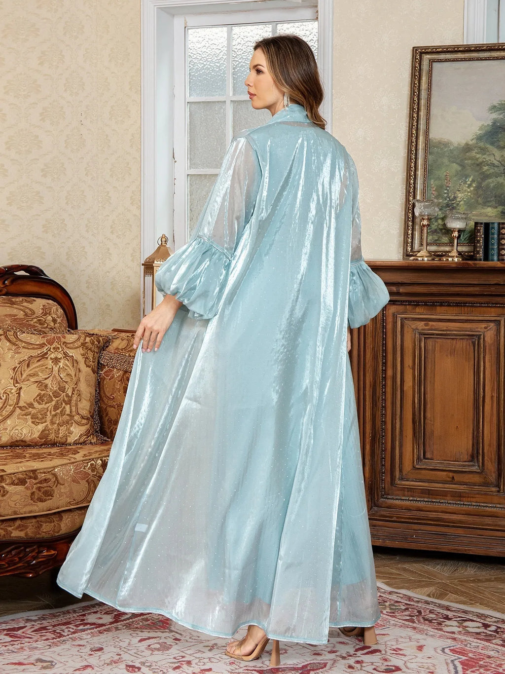 Blue Arabic two-piece formal dress set with rhinestone detailing and long sleeves.