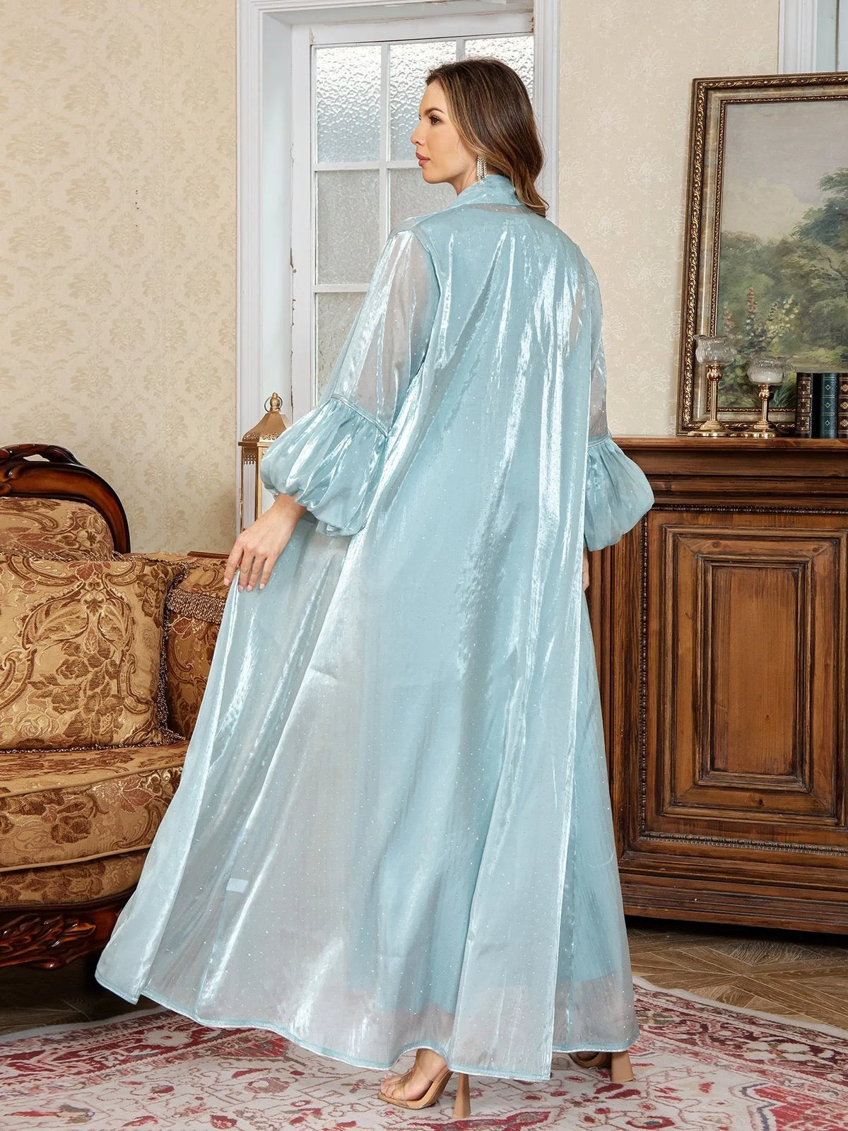 Blue Arabic two-piece formal dress set with rhinestone detailing and long sleeves.