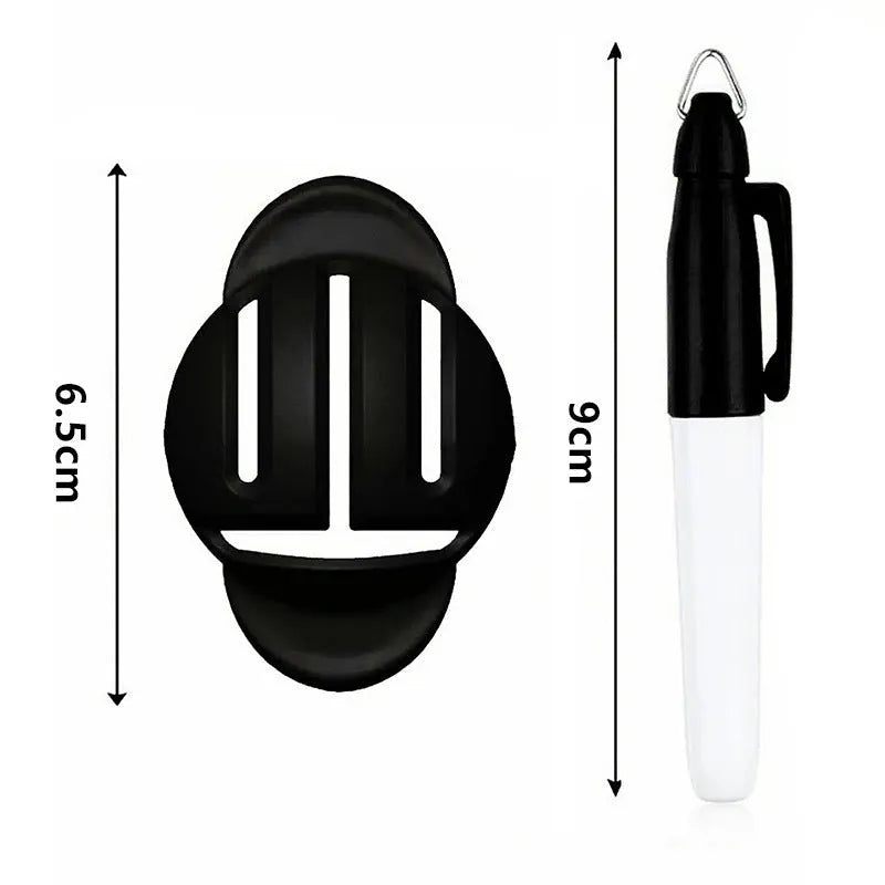 Plastic golf scriber putter alignment tool set with marking pens on a green background.