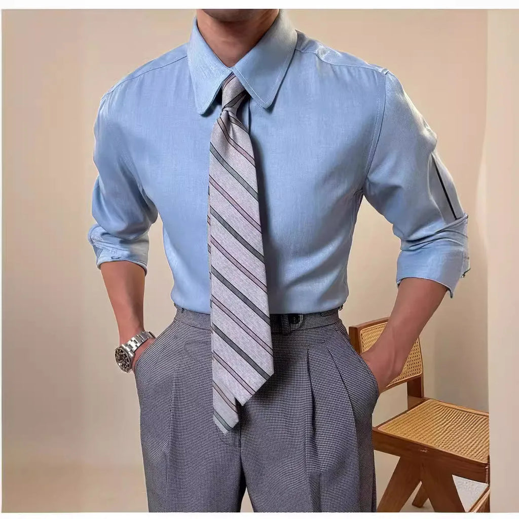 Men's blue slim fit long sleeve shirt with round collar shown in business casual styling